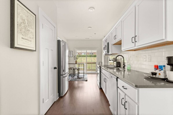 Fridge, microwave, dishwasher, coffee/tea maker