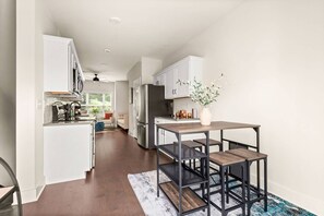 Fridge, microwave, dishwasher, coffee/tea maker