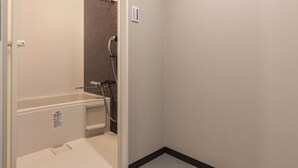 A bathroom with a shower, toilet, and sink. - Mr.KINJO Miyakojima Aparagi Resort 1 (Miyakojima)