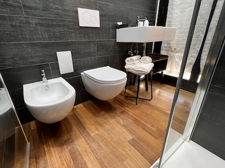 Shower, eco-friendly toiletries, hair dryer, bidet. Large deluxe family room with private bathroom and terrace