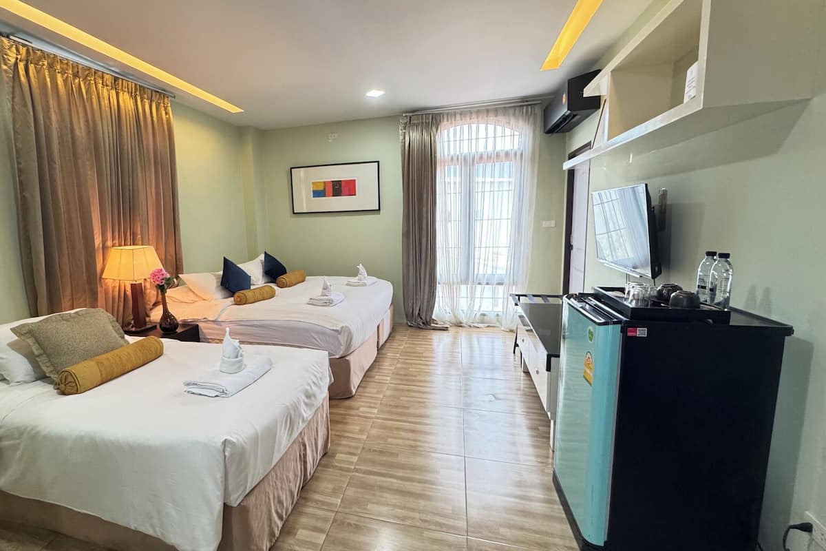 Phòng 3 Deluxe | Phòng cách âm, truy cập Internet không dây miễn phí, bộ trải giường 