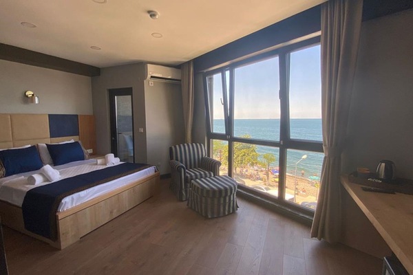 Premier Double Room, 1 Double Bed, Non Smoking, Sea View | Minibar (free items), bed sheets