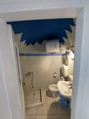 Studio | Bathroom | Shower, hair dryer, towels, soap - Studio in Old Port of Fira, Sea View, Santorini (Santorini)