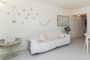 21-inch flat-screen TV with cable channels, TV