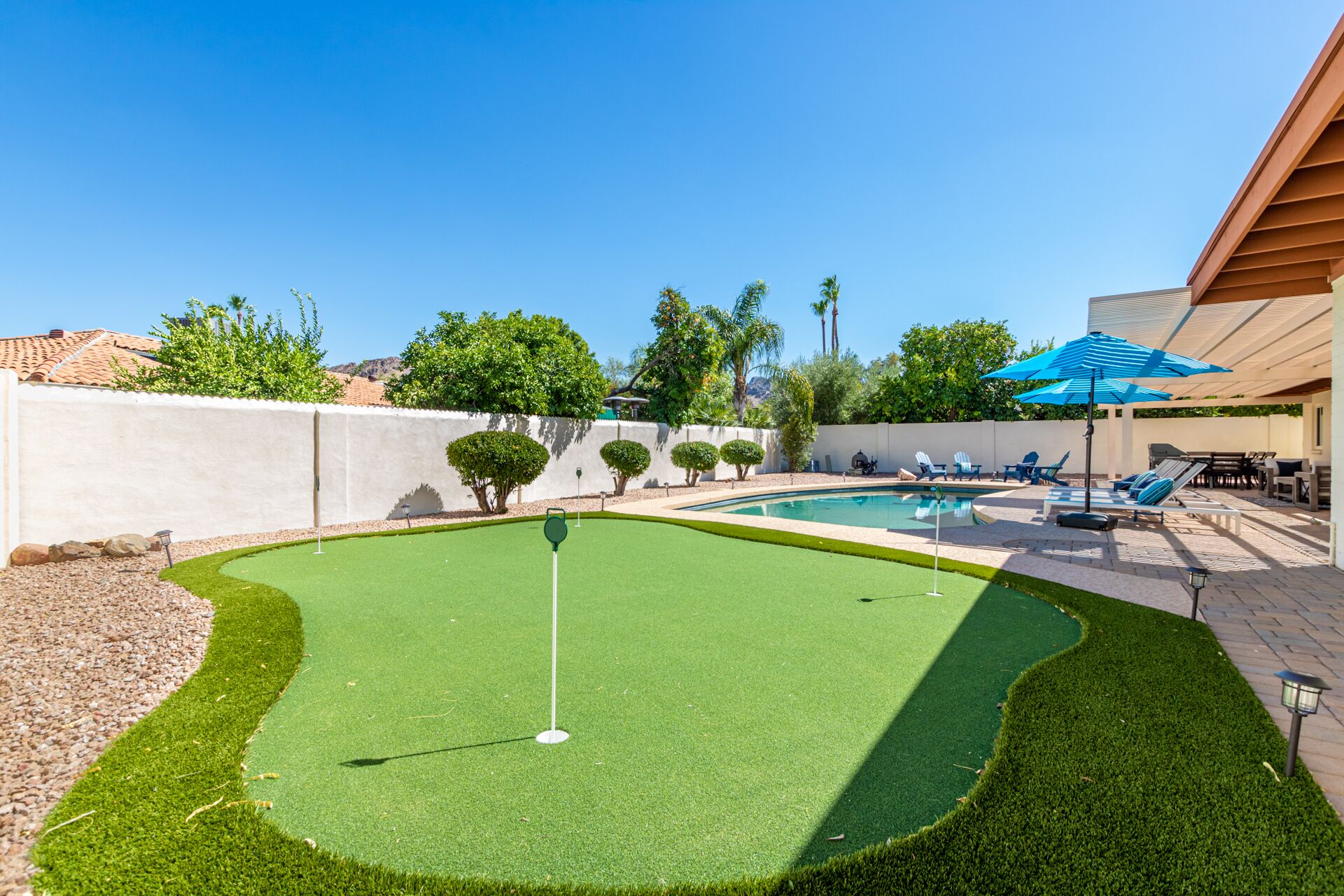 A heated pool, pool loungers