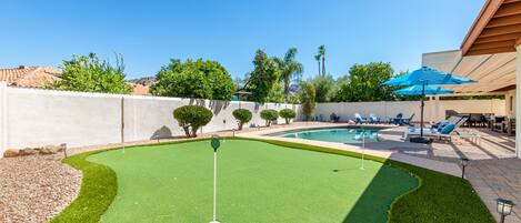 A heated pool, pool loungers