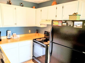 Microwave, dishwasher, coffee/tea maker, cookware/dishes/utensils