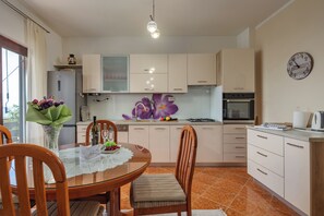 Family Apartment, 1 Bedroom, Balcony (Kostrena Apartment Maja) | Private kitchen | Fridge, microwave, oven, stovetop