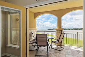 Outdoor dining - Lakefront Corsicana Condo: Pool & Private Balcony! (Corsicana)