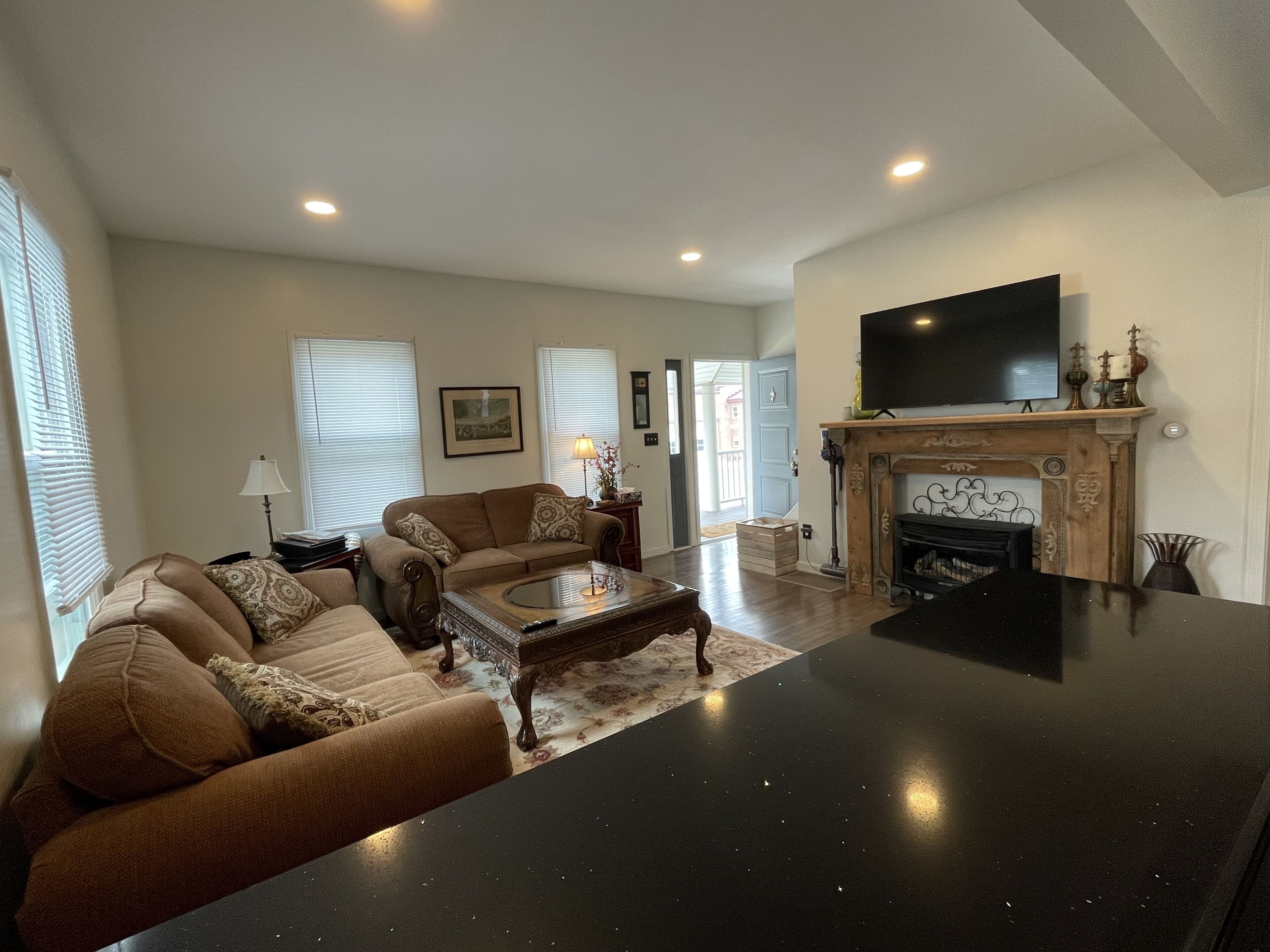 Smart TV, fireplace, books