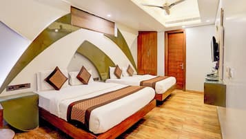 Deluxe Triple Room | Individually decorated, individually furnished, desk, laptop workspace