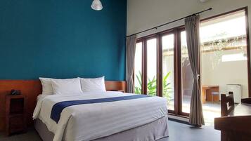 Premium bedding, memory foam beds, laptop workspace, blackout drapes