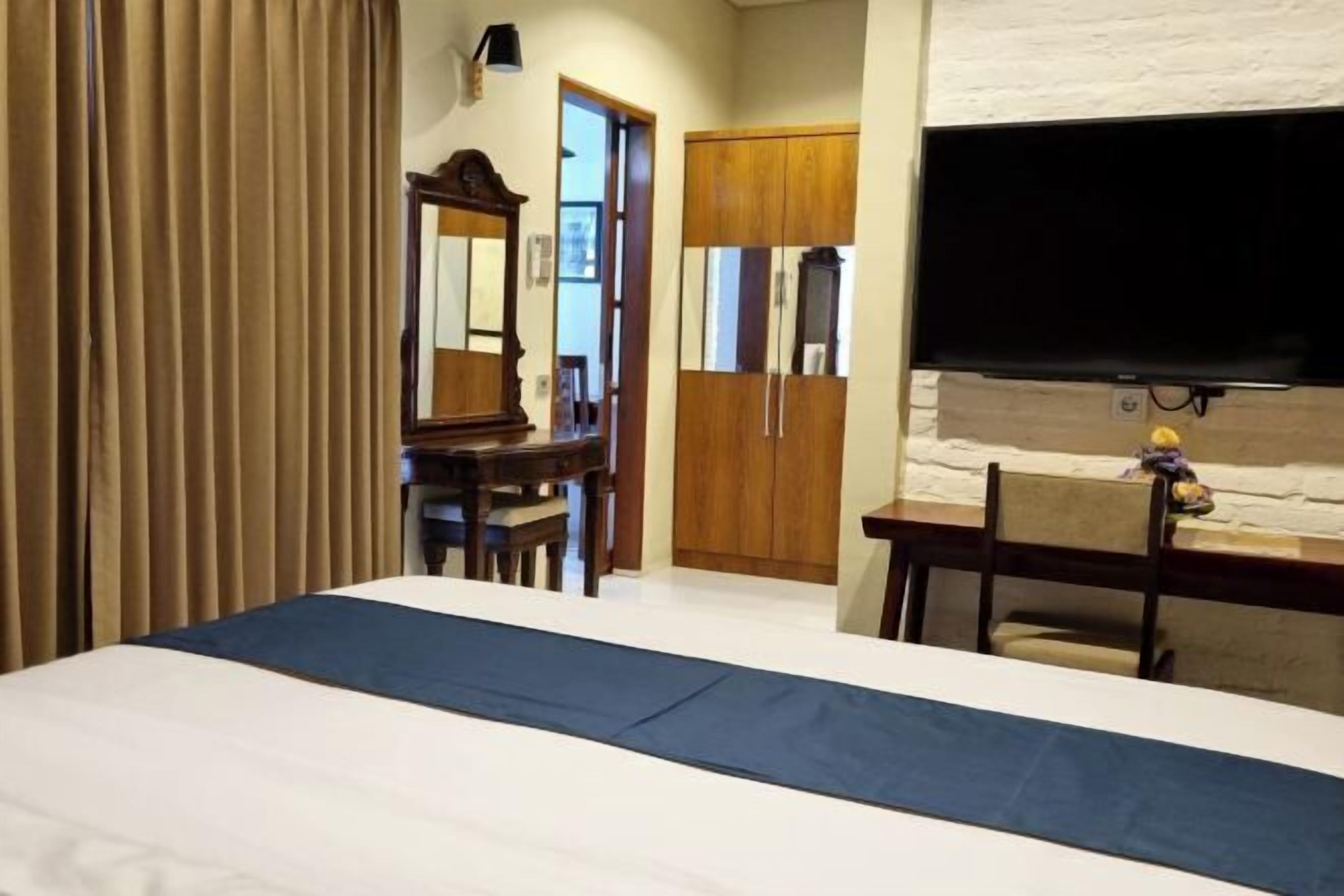 Premium bedding, memory-foam beds, blackout curtains, iron/ironing board