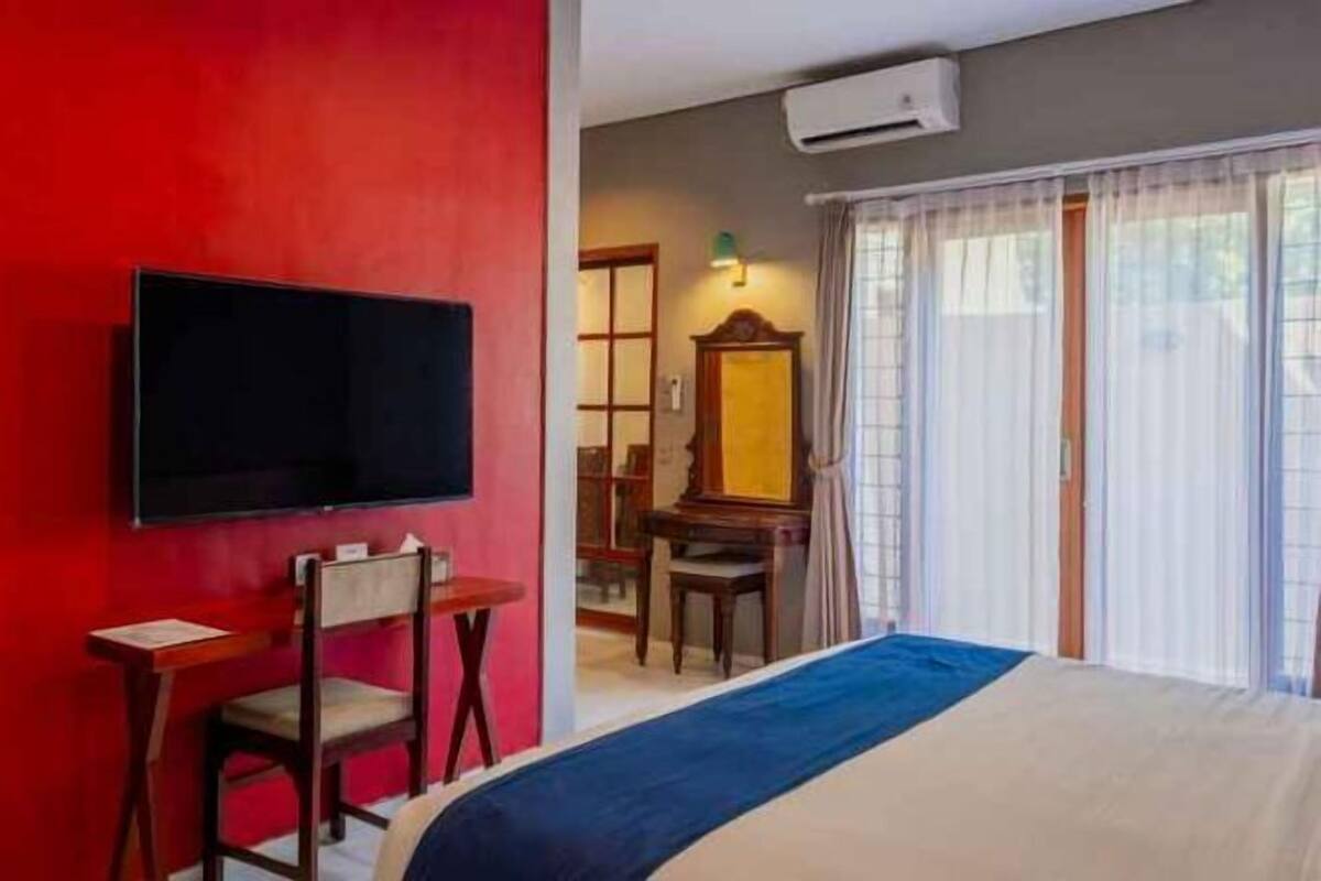 Premium bedding, memory foam beds, laptop workspace, blackout drapes