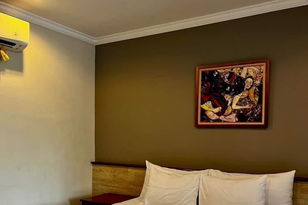 Junior Room | Premium bedding, memory foam beds, laptop workspace, blackout drapes