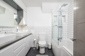 Hair dryer, towels, soap, shampoo