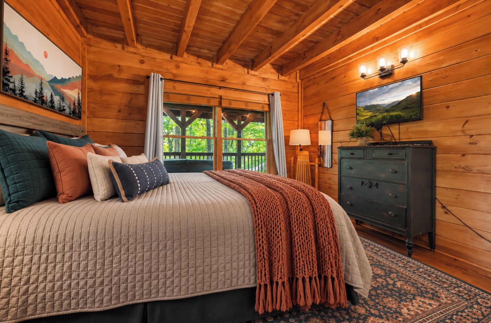 Une chambre dans une cabane en bois, avec un lit, des oreillers, une commode et un tableau accroché au mur.
