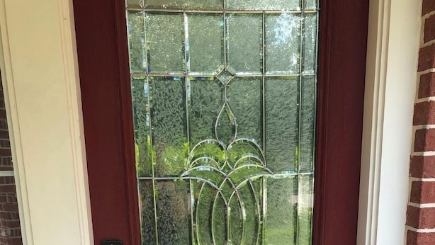 A red door with a glass panel and a keypad lock. - Family-friendly 3 bedroom retreat, in shared house (Katy)