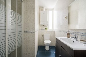 Shower, hair dryer, soap, shampoo