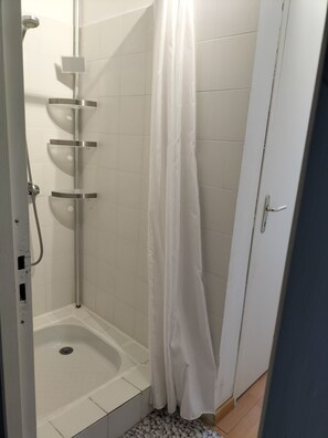 Shower, hair dryer, soap, shampoo