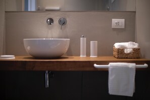 Shower, eco-friendly toiletries, hair dryer, bidet