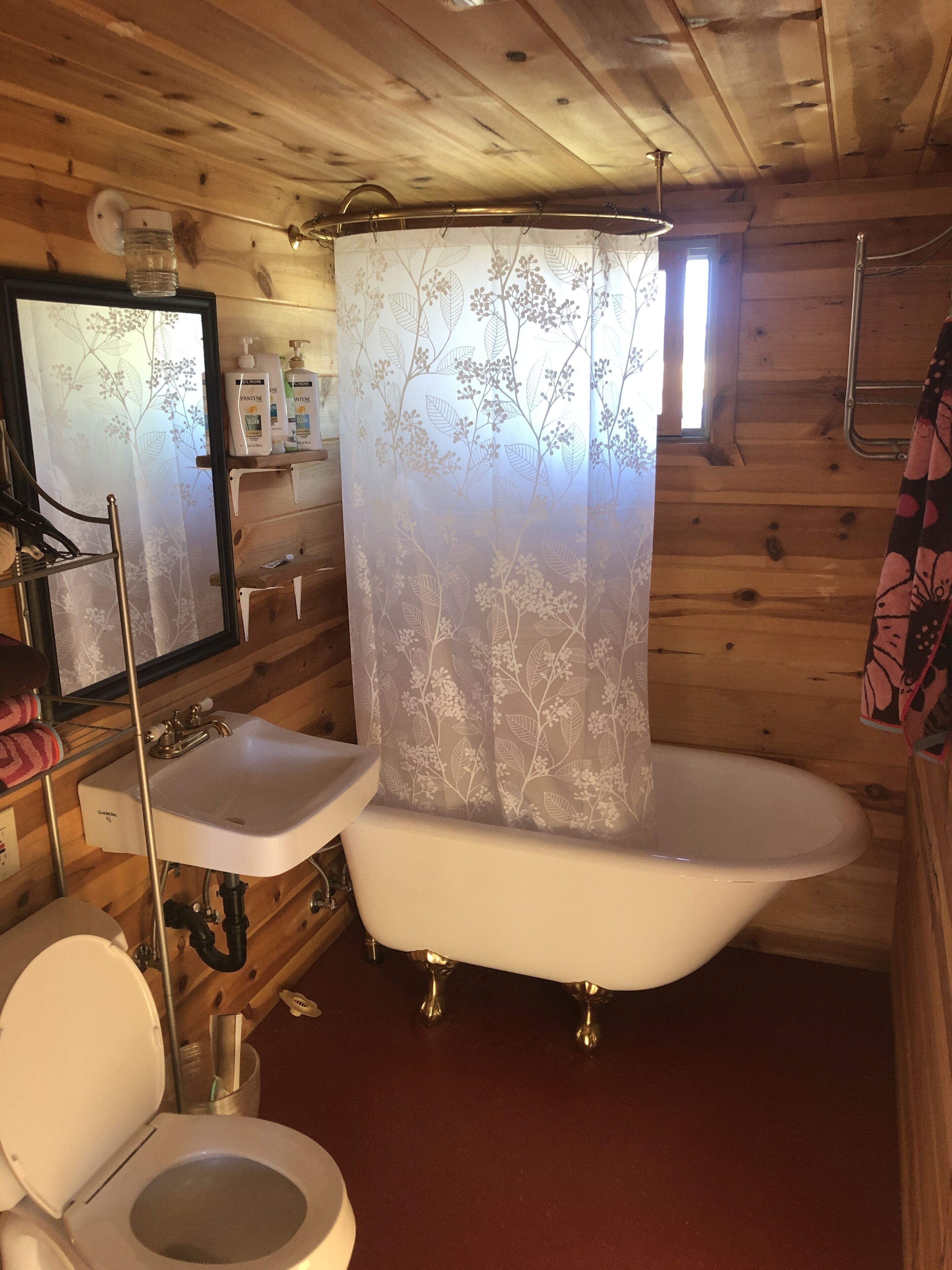 Combined shower/tub, hair dryer, towels, soap