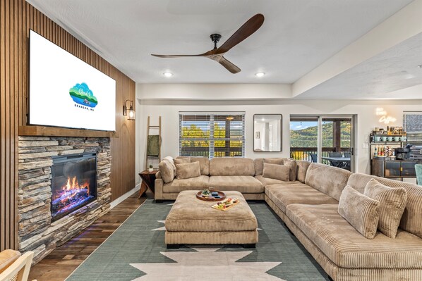 Smart TV, fireplace, table football, books