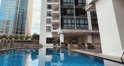 Luxurious 1BR Across Uptown Mall, Mitsukoshi Mall, & Grand Hyatt - Pet friendly!