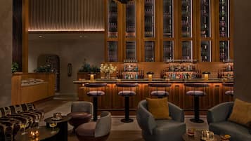 3 bars/lounges, cocktail bar, lobby lounge, rooftop bar