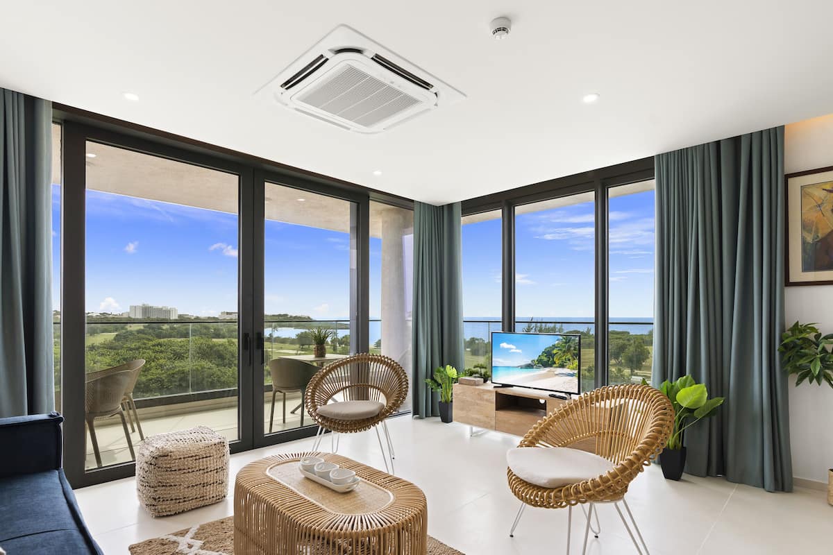Deluxe Apartment, 1 Bedroom, Balcony, Beach View | Living area | Smart TV