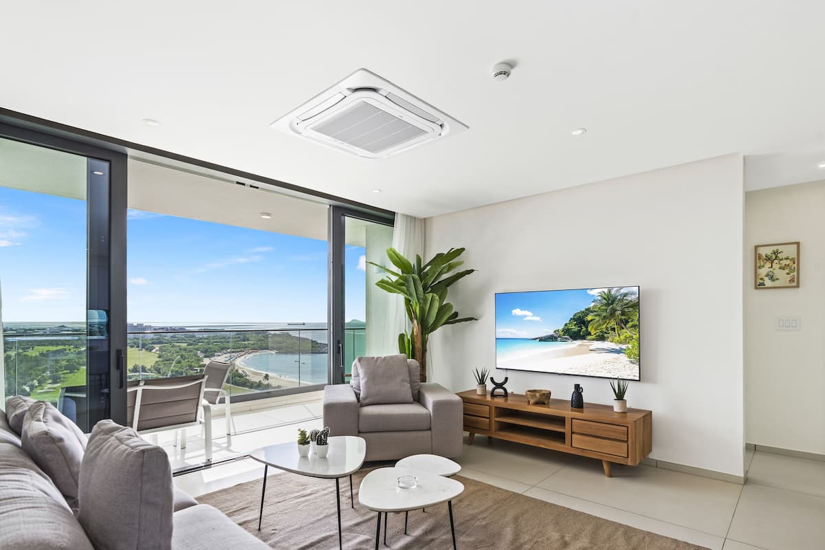 Deluxe Apartment, 2 Bedrooms, Balcony, Beach View | Living area | Smart TV