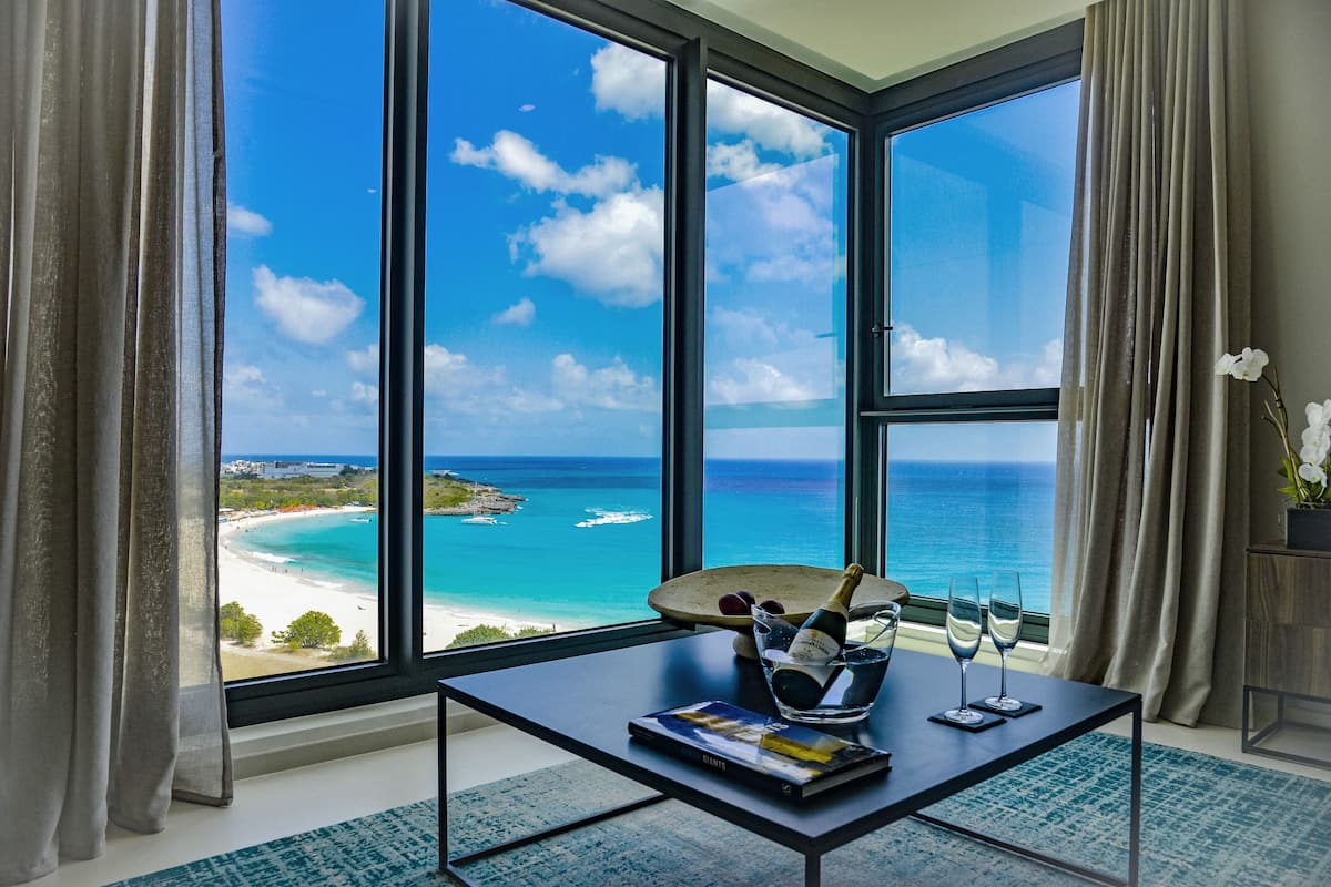 Deluxe Condo, 1 Bedroom, Beach View | Living area | Smart TV