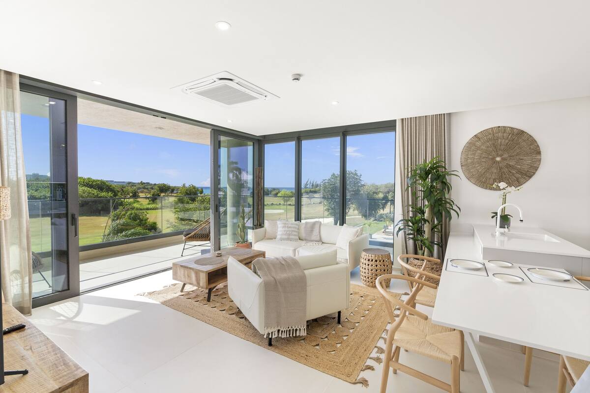 Deluxe Apartment, 1 King Bed, Balcony, Pool View | Living area | Smart TV