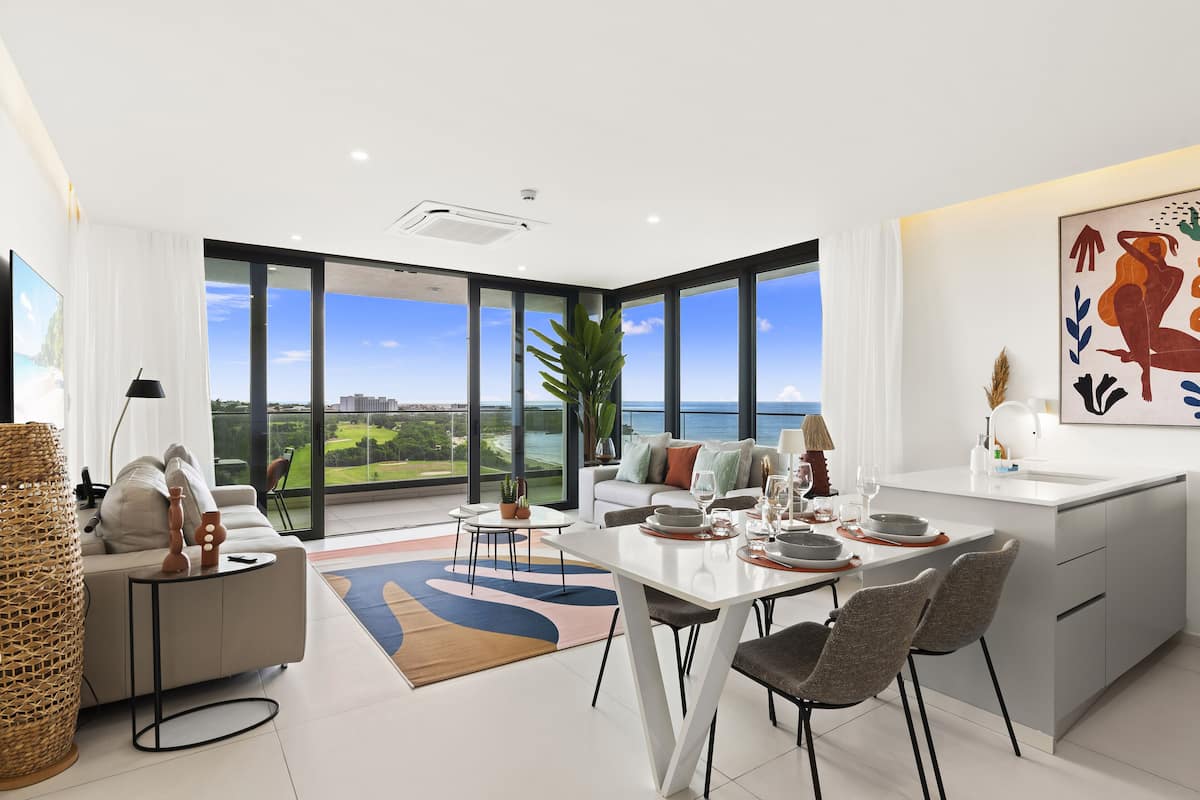 Deluxe Apartment, Balcony, Beach View | Living area | Smart TV