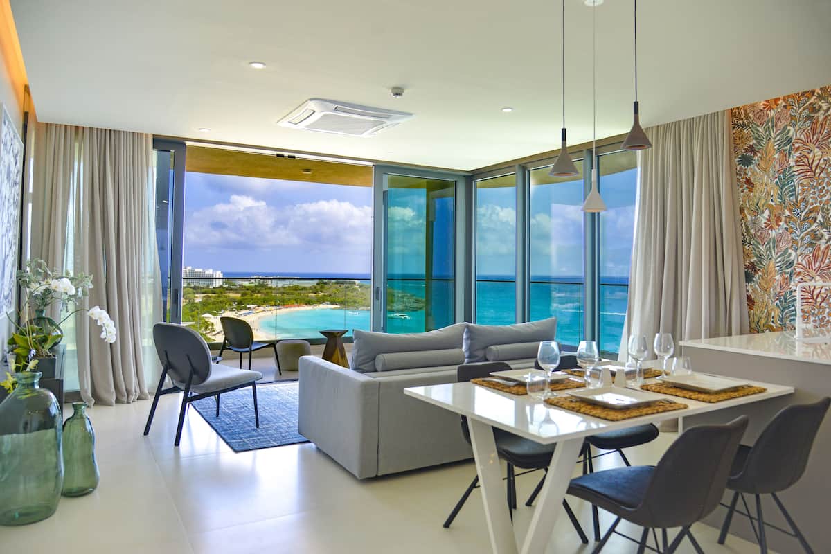 Deluxe Condo, 1 Bedroom, Balcony, Beach View | Living area | Smart TV
