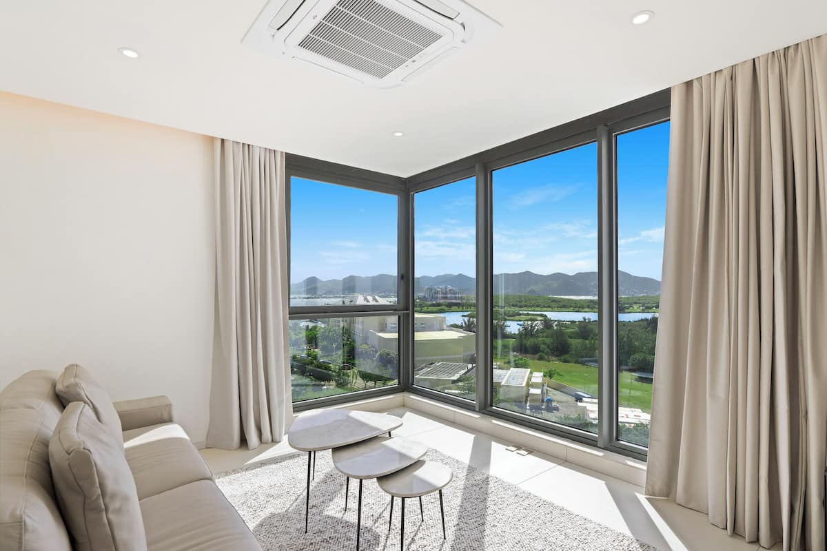 Comfort Apartment, 1 King Bed, Lagoon View | Living area | Smart TV