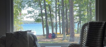 Spacious vacation home on large private wooded lot on crystal clear Hubbard Lake