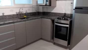 Comfort Apartment | Private kitchen | Fridge, oven, cookware/dishes/utensils