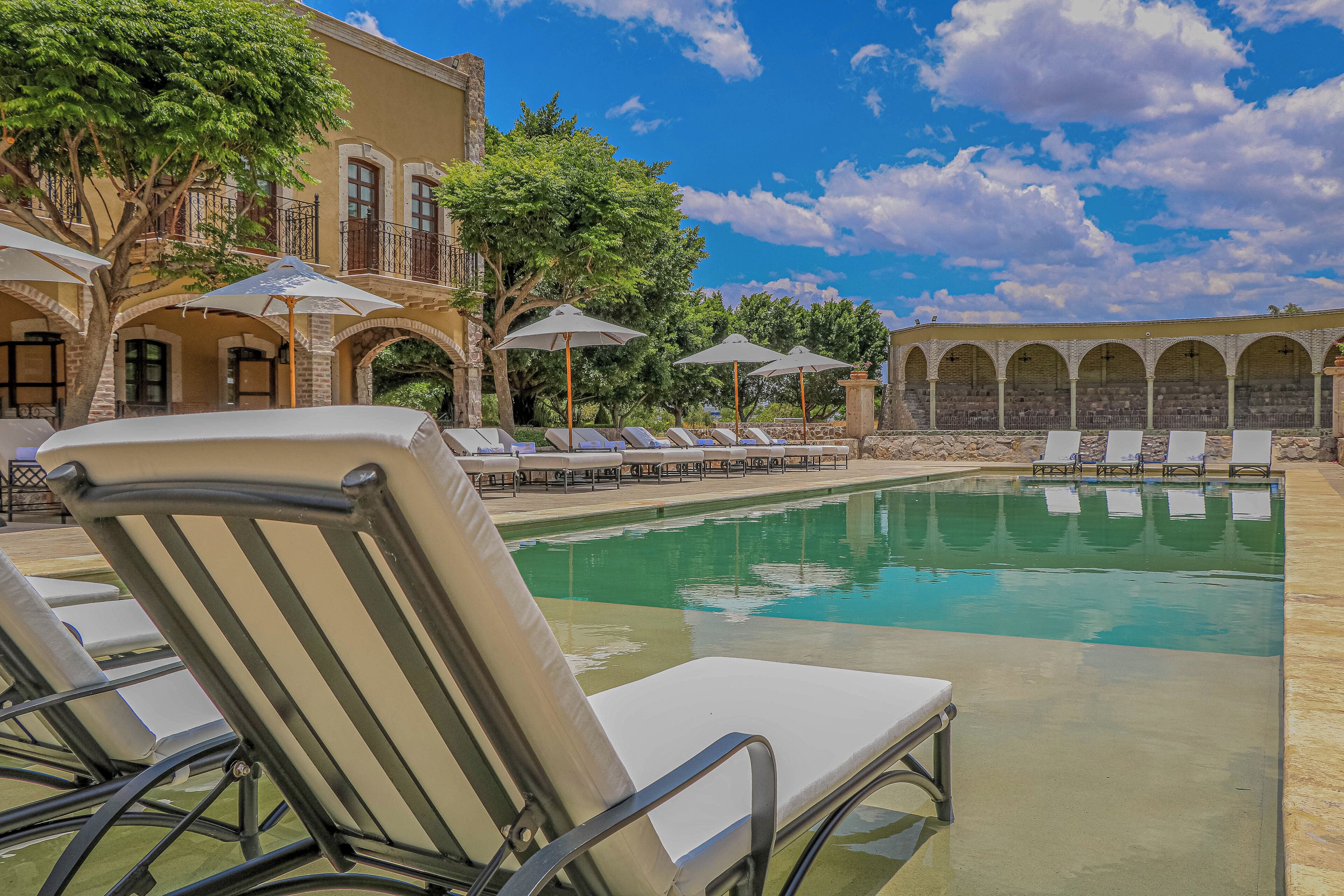 Outdoor pool, free cabanas, pool umbrellas