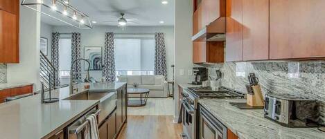 Fridge, coffee/tea maker, cookware/dishes/utensils