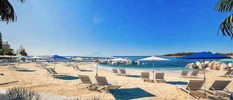 Beach nearby, sun loungers