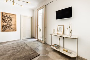 Apartamento | 2 dormitorios y tabla de planchar con plancha