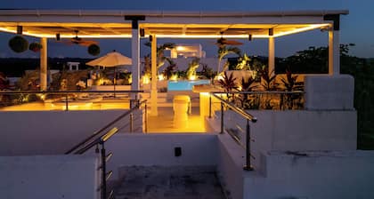 New Boho-Chic Beachfront Penthouse w/Dior inspired Rooftop Oasis & Infinity Pool