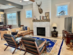 Smart TV, fireplace, books
