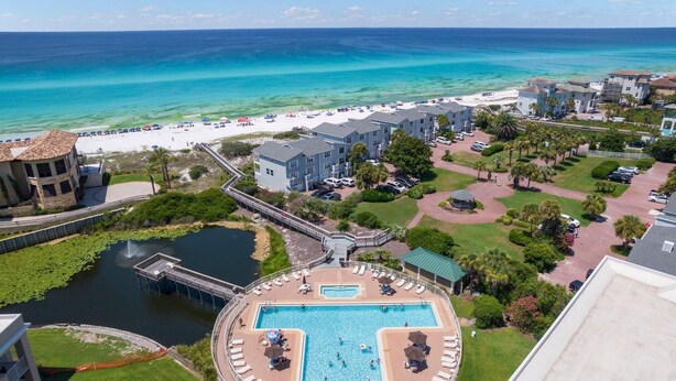 A resort with a swimming pool, beach access, and a view of the ocean. - Comfy 1-Bedroom, 2-Bath Condo in Gated Community - Includes 3 Adult Bikes! (Santa Rosa Beach)