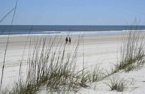 On the beach, sun-loungers, beach towels