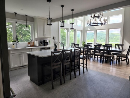 Luxury hillside house with a picturesque mountain view