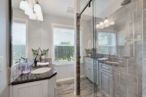 Shower, hair dryer, towels, soap