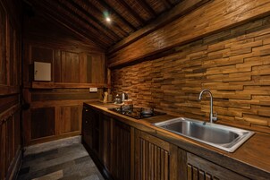 Villa | Private kitchen | Full-size fridge, microwave, stovetop, dishwasher