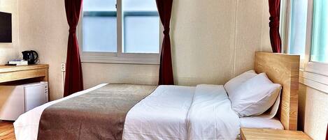 Desk, blackout curtains, soundproofing, free WiFi